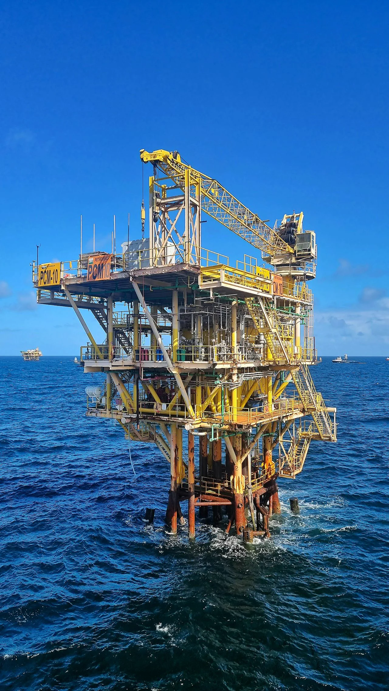 Offshore oil production platform standing in open sea